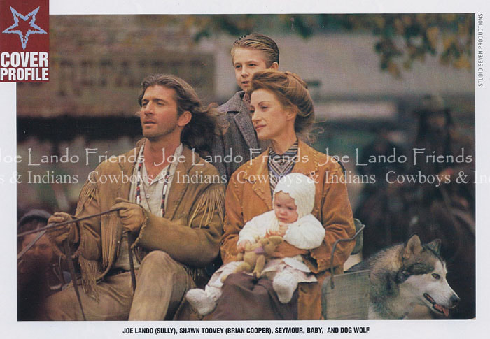 Joe Lando, Jane Seymour, Brian Toovey, and Baby Calebrese riding in a wagon.